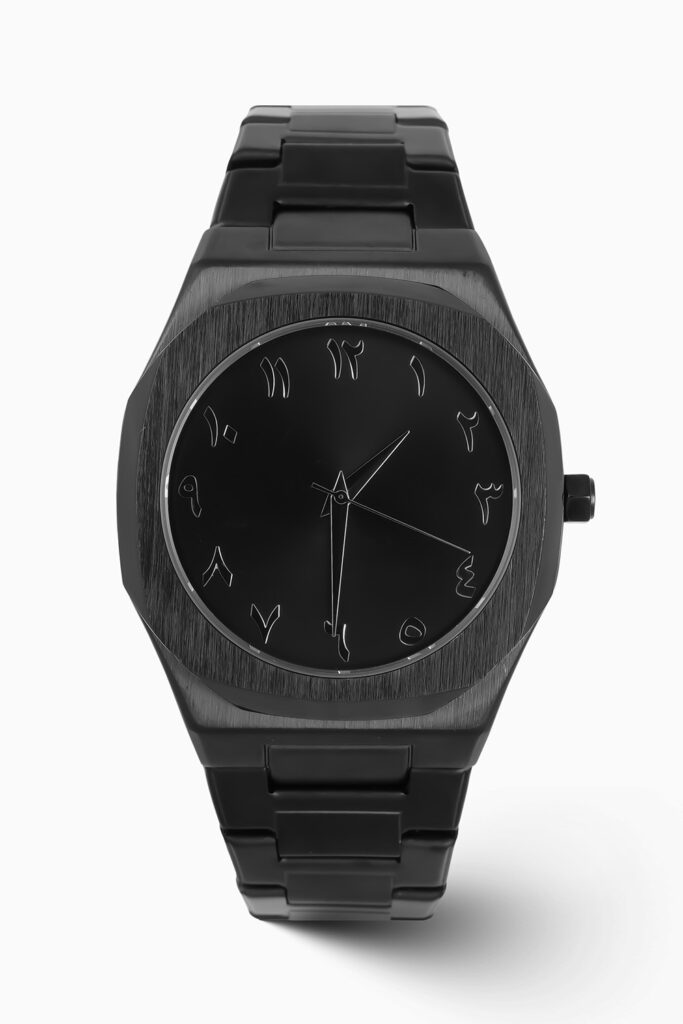 Black Arabic Aura inspired luxury watch with sleek dial and modern stainless steel case.