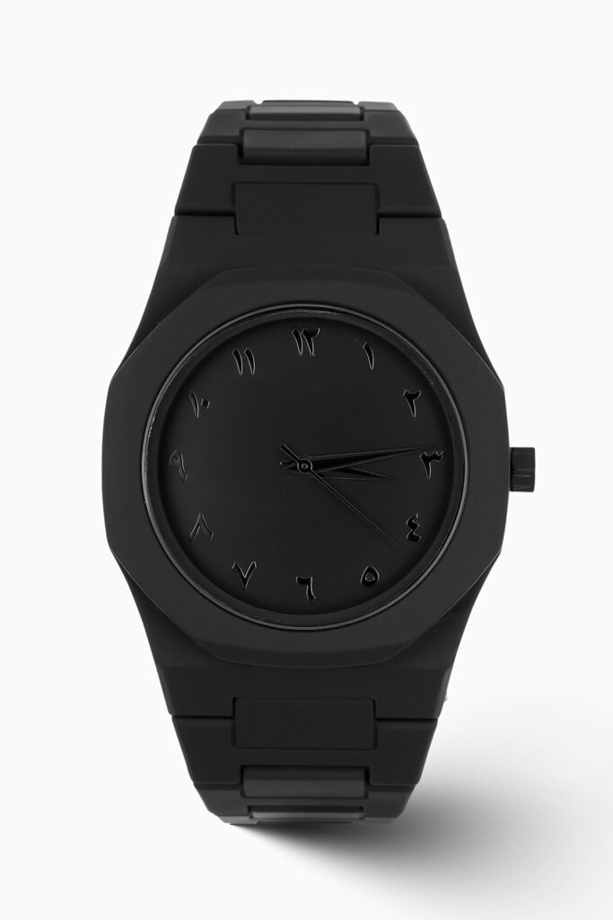Matte Black Arabic Aura inspired luxury watch with sleek dial and modern stainless steel case.